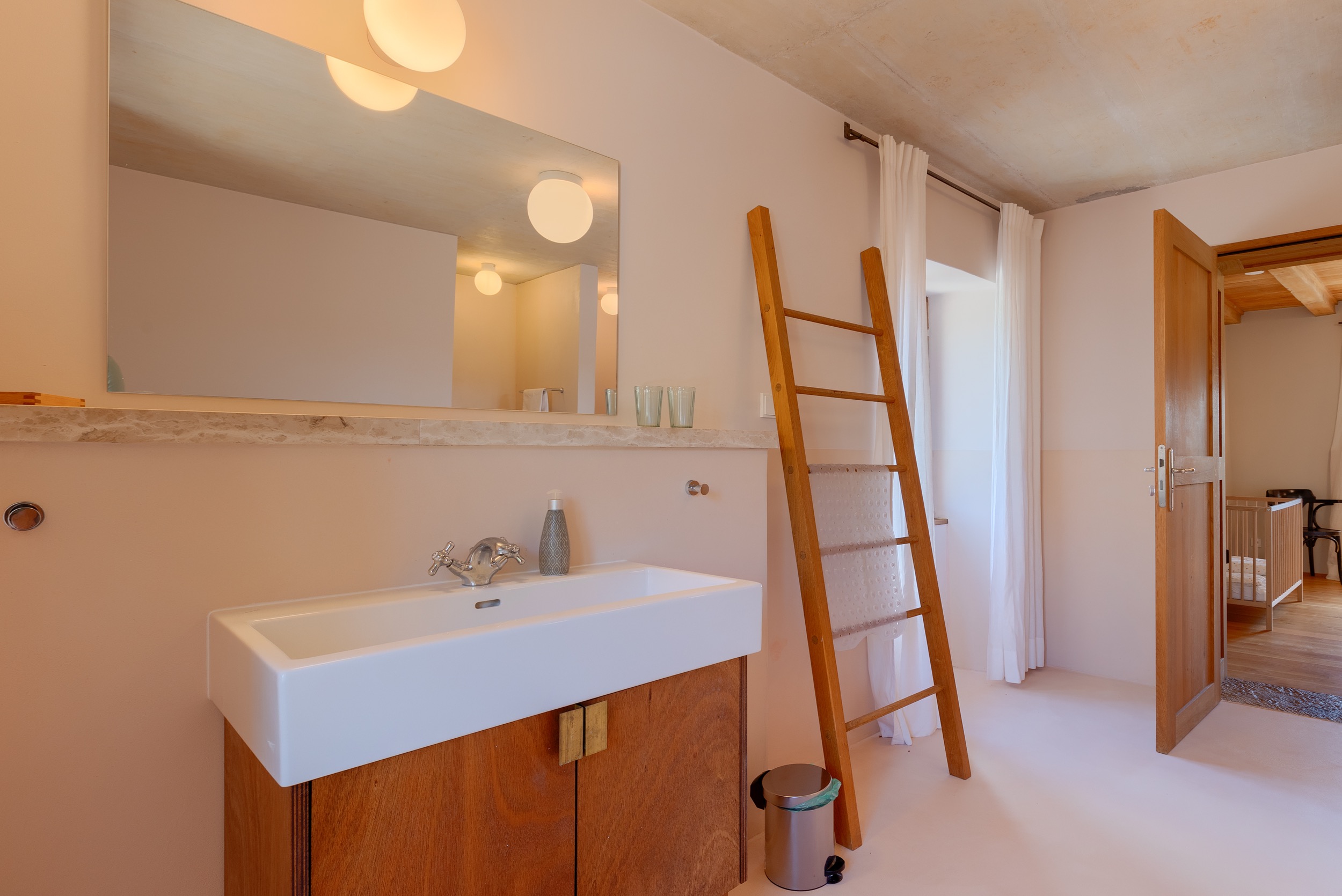 casa ceppi istria croatia interior bathroom single vanity wooden ladder towel rack