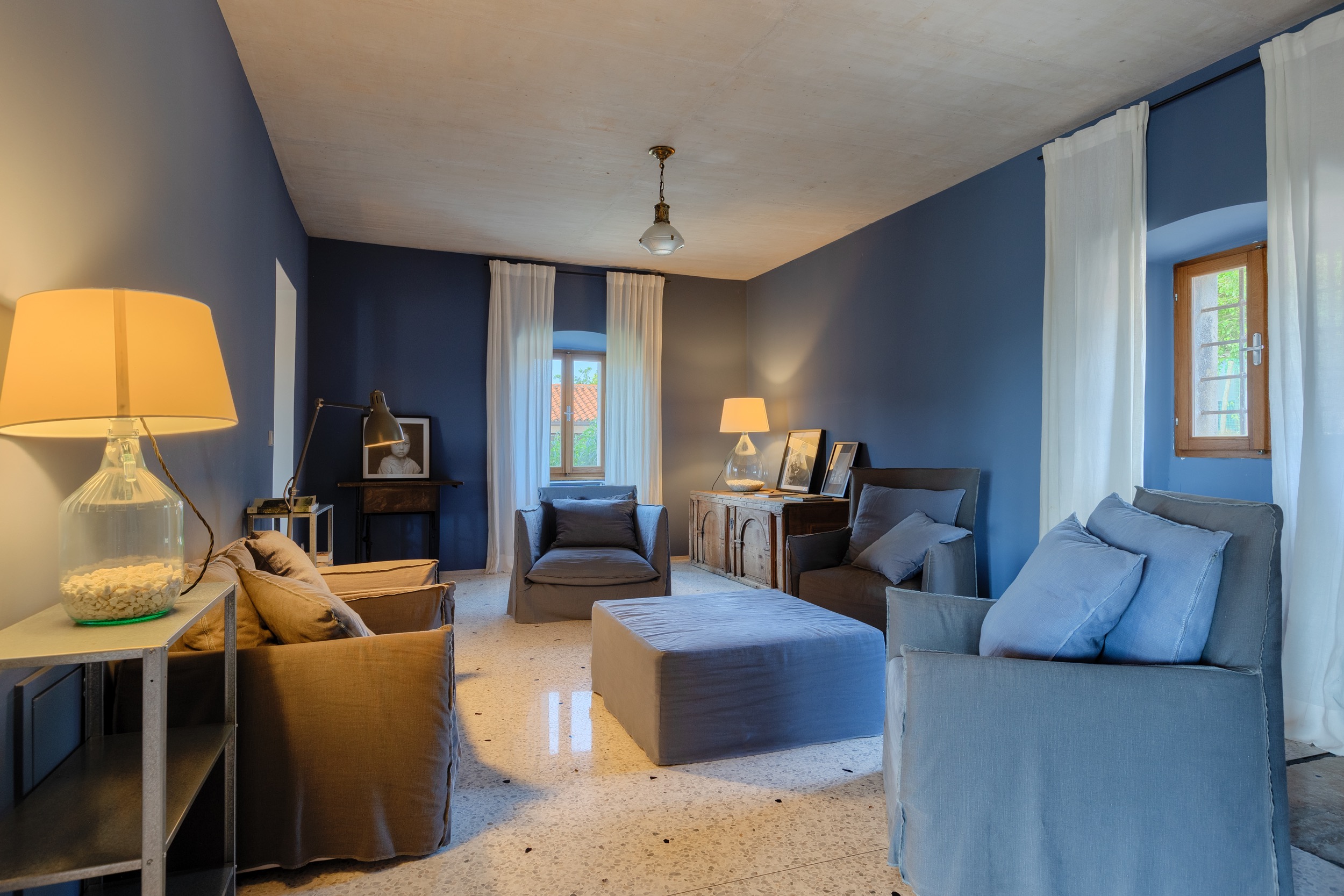 casa ceppi istria croatia interior blue living room lamps armchairs terrazzo floor