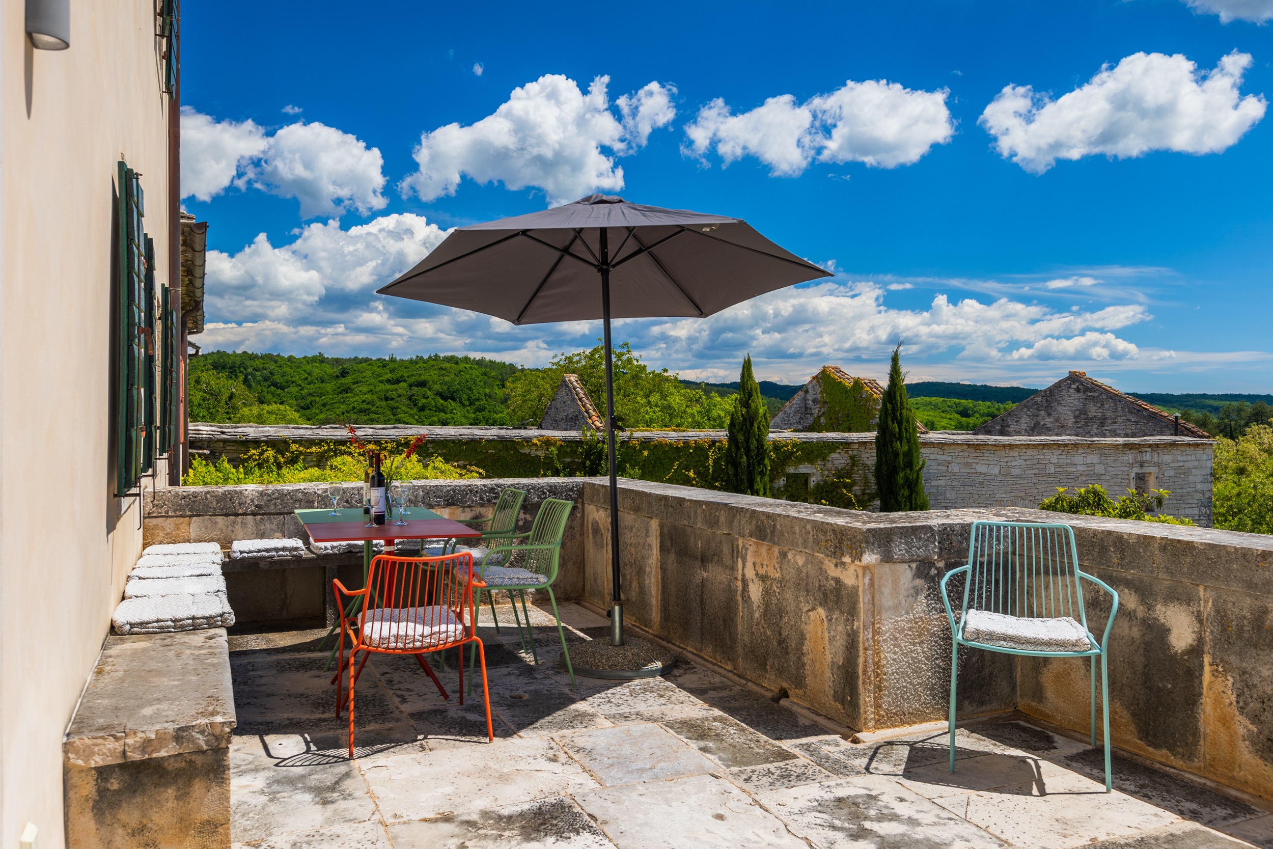casa ceppi istria croatia rooftop terrace umbrella chairs countryside view